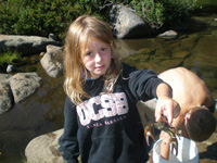 Picture of small girl with crawdad in hand
