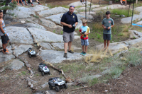 picture of children with remote control toy jeeps
